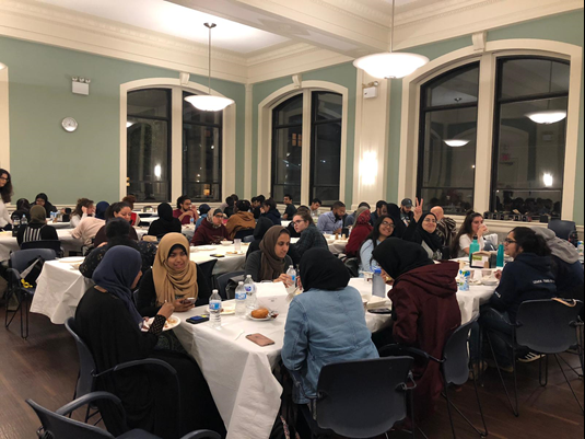 Muslim students enjoying halal food in Hewitt dining hall. 
